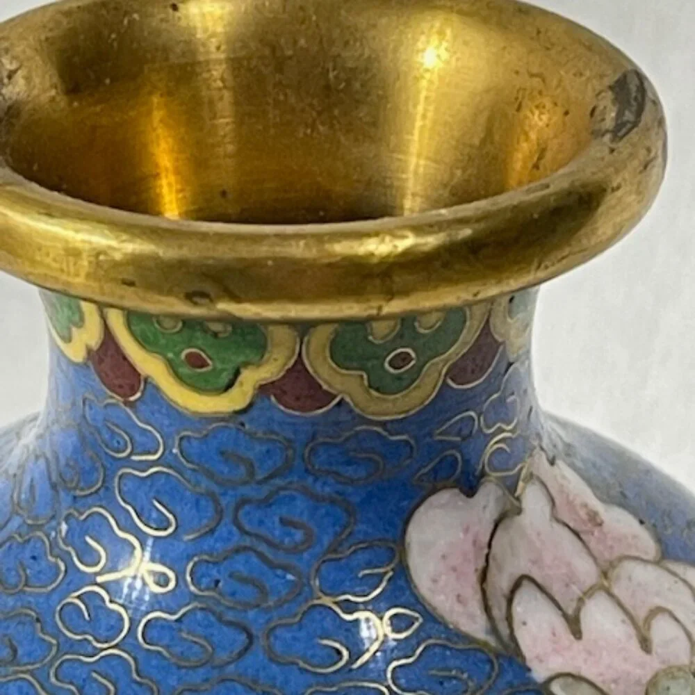 Chinese blue cloisonne and brass vase with wooden stand.